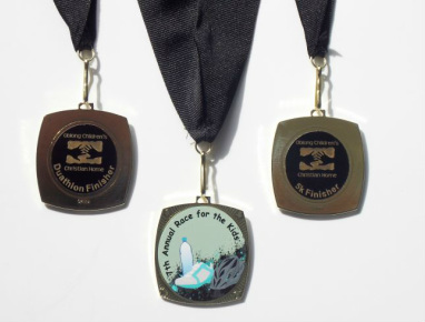 Medal for 7th Annual Race for the Kids 2014